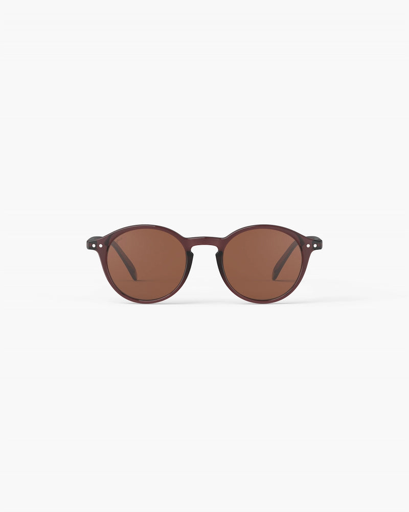 Brown round sunglasses with brown lenses on a white background