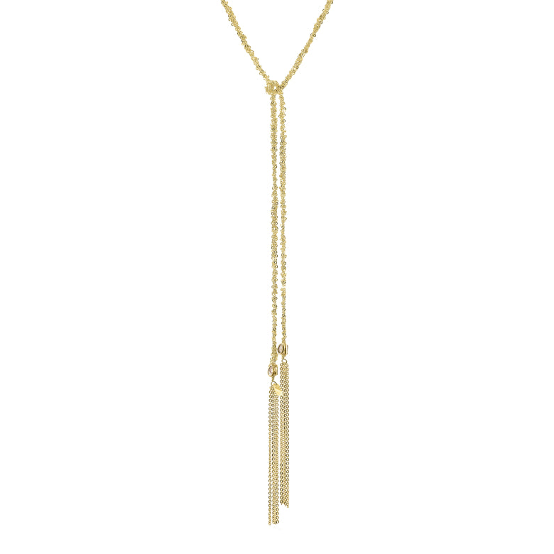 Gold necklace with tassel on a white background