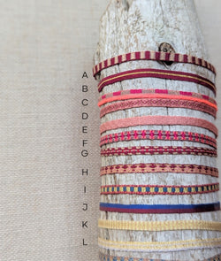 Set of woven bracelets on a textured surface

Guanabana woven bracelet jewelry store sowa boston gift shop small business boutique small gifts for her 