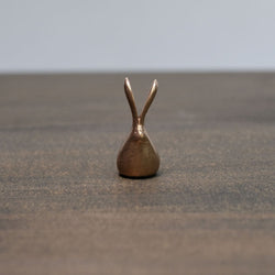 Adorable small bronze rabbits.