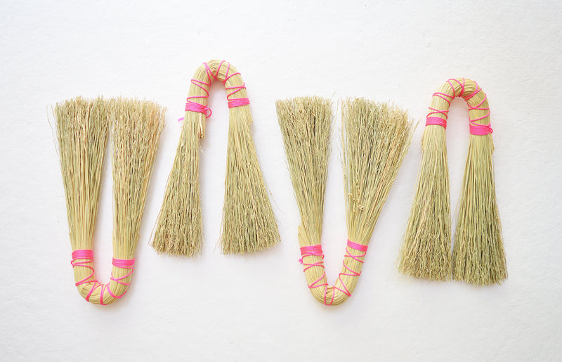 Double hand broom with neon pink nylon looping. by Sunhouse Craft. Handwoven in Kentucky.  