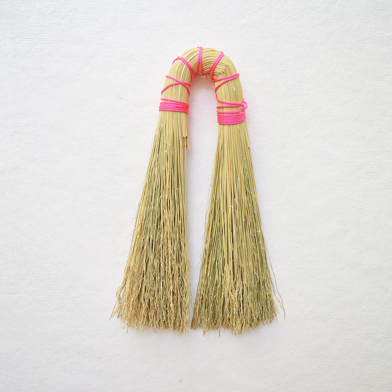 Double hand broom with neon pink nylon looping. by Sunhouse Craft. Handwoven in Kentucky.  