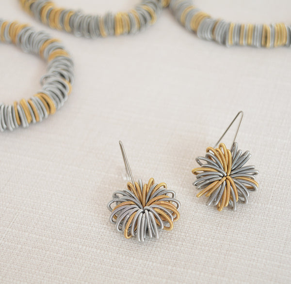 La Mollla stainless steel earrings mixed metals made of industrial springs