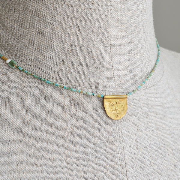 Turquoise half moon talisman necklace by River Song jewelry. 24k gold over sterling silver. 
