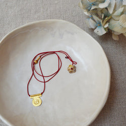 Hand-stamped talisman necklace by River Song jewelry. For personal protection, health and good fortune. shop boston