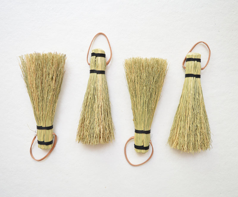 Great simple brush for whisking away dirt or debris from the garden or cleaning up dried mud off of shoes. Black hemp cord and leather tie for hanging. Handmade in Kentucky by designer/maker Cynthia Main of Sunhouse Craft.