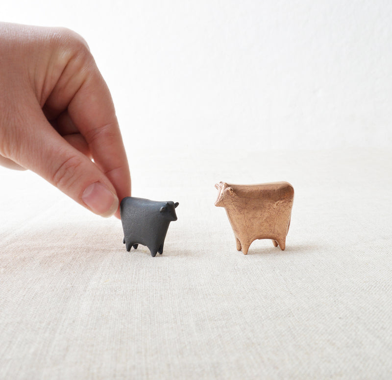 Adorable Japanese small bronze cow.
