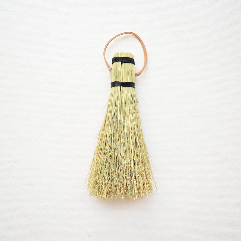 Great simple brush for whisking away dirt or debris from the garden or cleaning up dried mud off of shoes. Black hemp cord and leather tie for hanging. Handmade in Kentucky by designer/maker Cynthia Main of Sunhouse Craft.