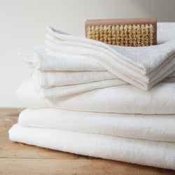 Wonderfully textured for gentle exfoliation and maximum absorbency, these quick-drying and durable diamond weave  towels are  woven from two layers of medium-weight, undyed 100% linen yarns. Whitened without the use of chlorine bleach.  Towels will arrive pressed and take on a quilted appearance after machine wash and dry, becoming softer with use.  For greater exfoliation, hang to dry.