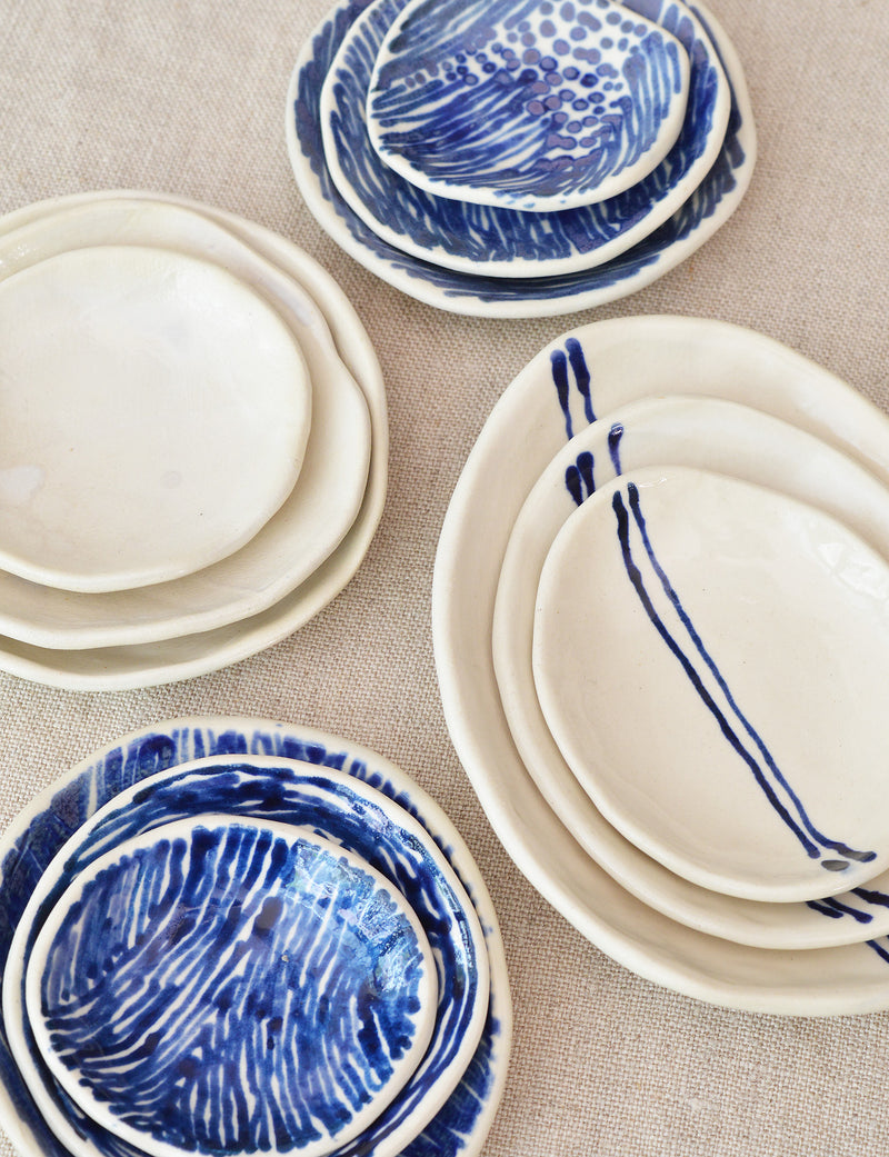 Ceramic nesting trinket dishes handmade and hand painted by Boathouse Pottery in Maine. 