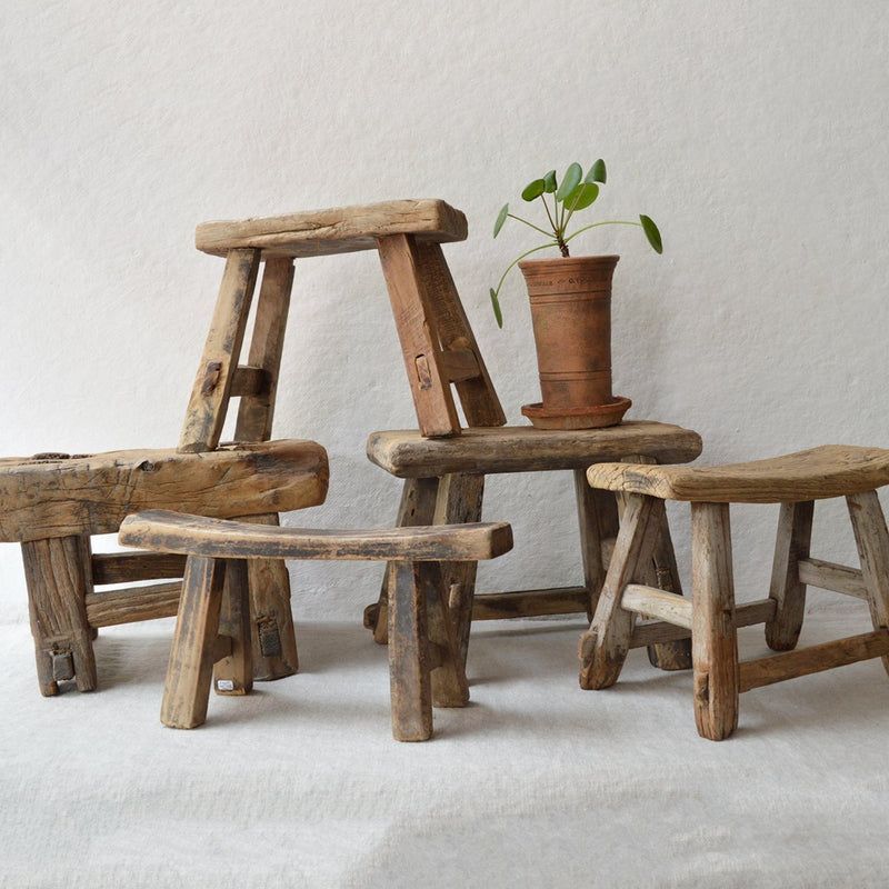 We love the simplicity of these old Chinese wood stools which were built for farmers or workers to sit on. They are ideal to display a special object or plant in your home, or for a child to sit on. The stools were used so have marks of wear which we think only add character to each piece. Each is unique, even though they have a similar construction.
