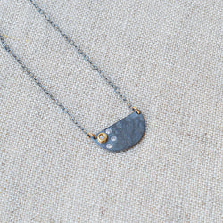 Nikki Nation oxidized silver and 18K gold callisto necklace. 