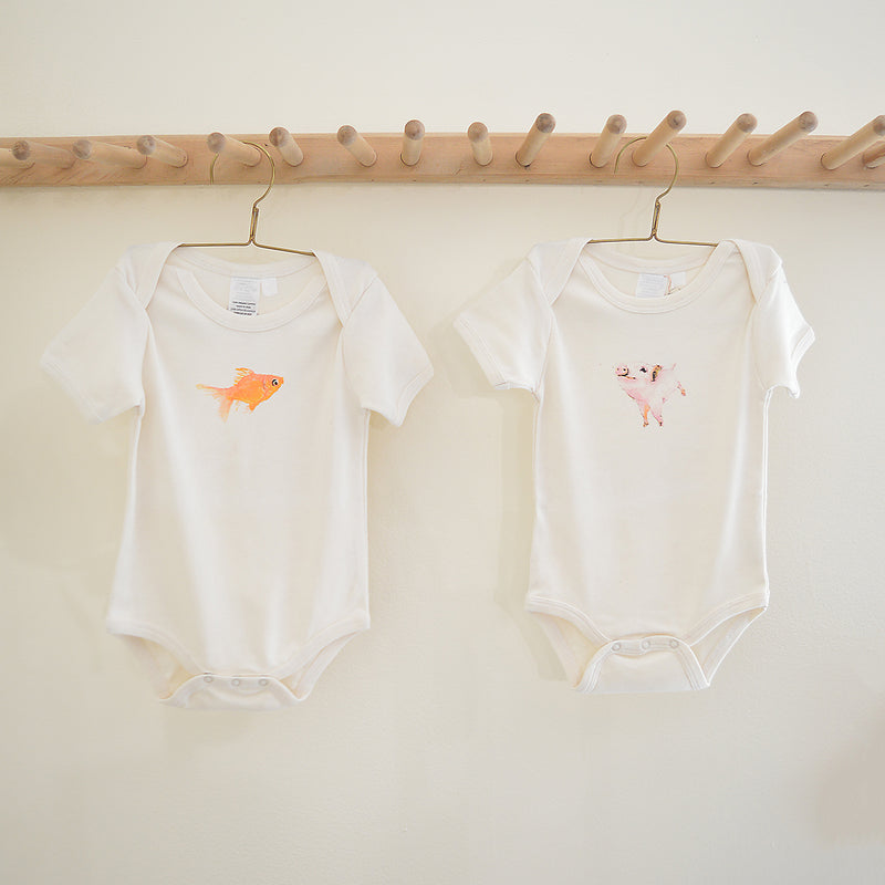Pig and Fish Eunco Baby Onsies Boston. One of our absolute favorite pics for the littlest member of your family. We adore these organic cotton onesies with the most precious pig and gold fish prints.Super soft and cozy with the most adorable prints.