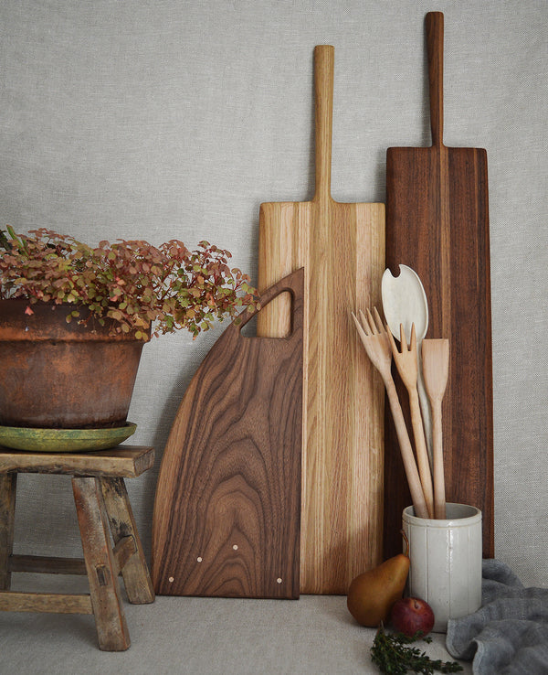 Long, oversized wood serving cutting boards will make a statement at your next dinner party. Handcrafted in Brooklyn by Phil Gautrau Design of locally-sourced and repurposed wood, Oak , Mixed Wood or Walnut