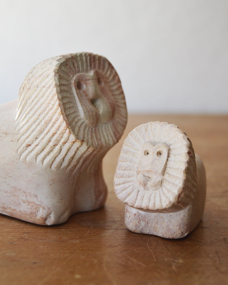 MCM Mid century modern  hand carved limestone travertina sculptures of a lion and her cub. 