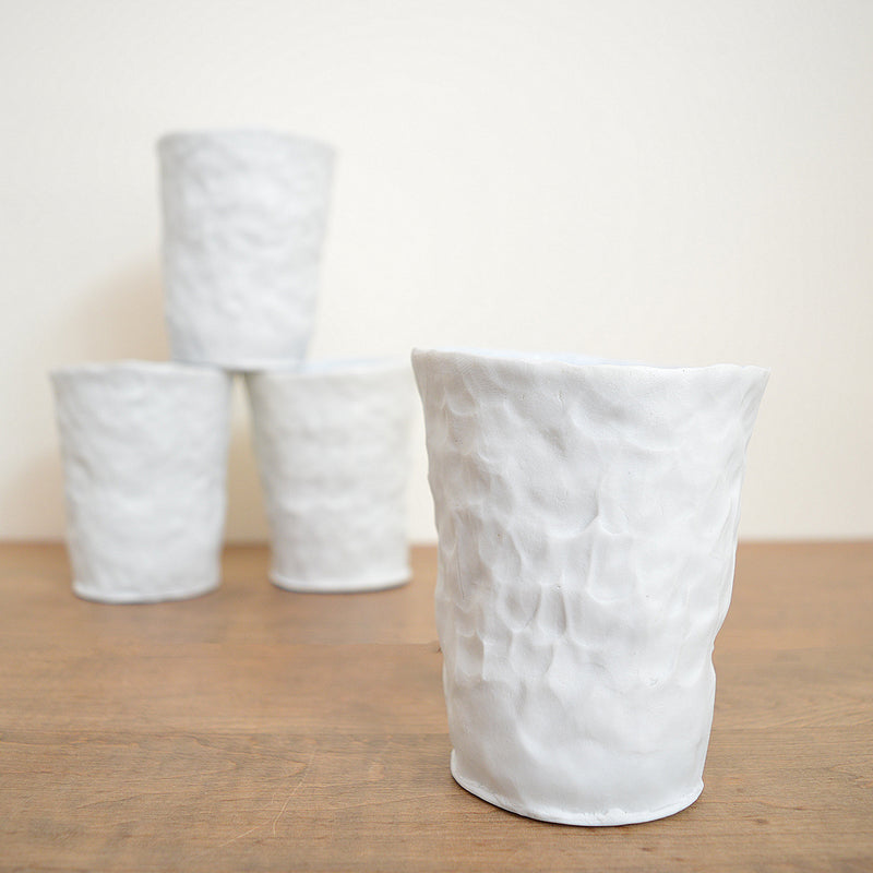 Hand pinched porcelain tumbler by Maine potter Ingrid Bathe. Available in Boston shop.