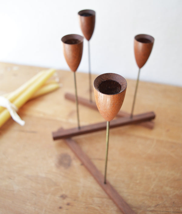 Vintage mid century modern foldable, articulated, candle holder. Made of teak wood and metal. 