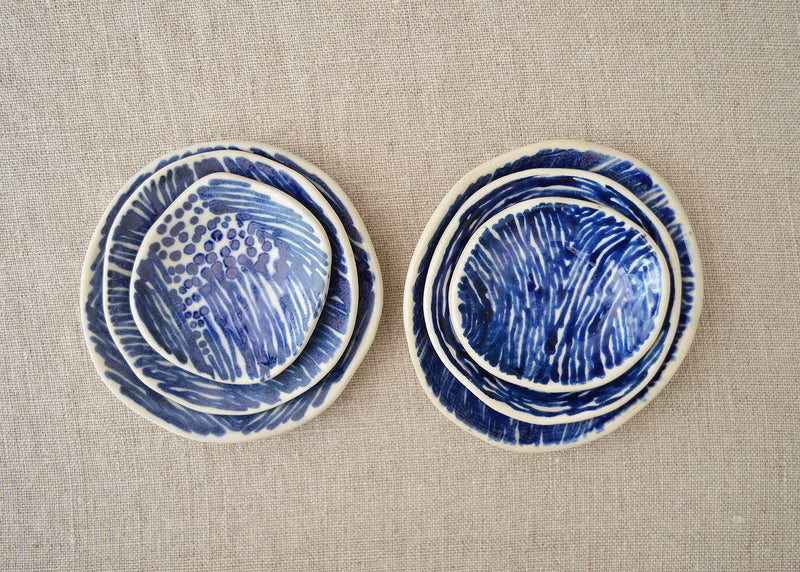 Ceramic nesting trinket dishes handmade and hand painted by Boathouse Pottery in Maine. 