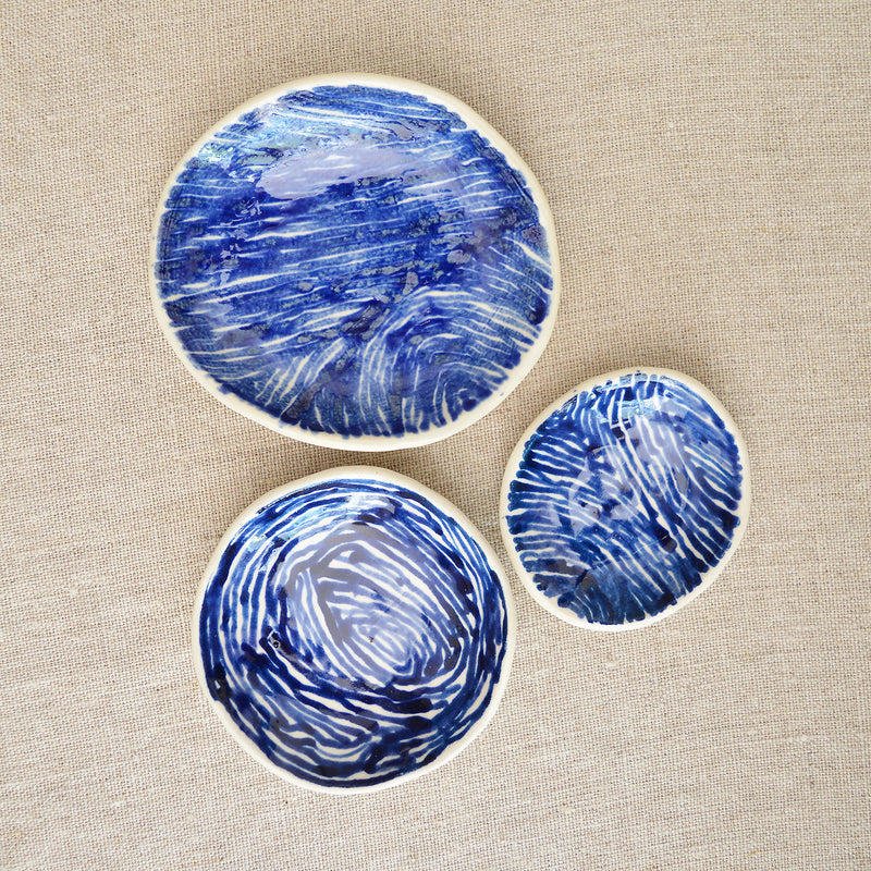 Ceramic nesting trinket dishes handmade and hand painted by Boathouse Pottery in Maine. 