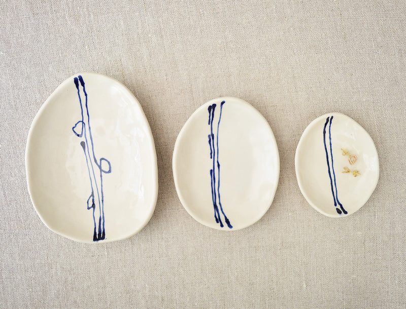 Ceramic nesting trinket dishes handmade and hand painted by Boathouse Pottery in Maine. 