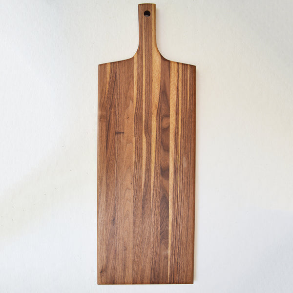 Beautiful spalted maple wood board, to serve charcuterie or to use for cutting. The large hole allows easy hanging when not in use. Handmade to last  in the U.S.  from sustainably sourced American lumber. 