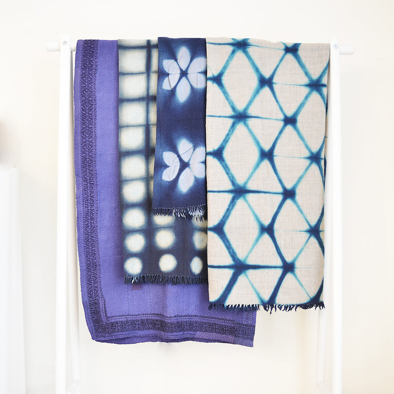 Our collection of indigo throws feature 100% wool khadi (homespun yarn and handwoven), in deep hand dyed shades of indigo in a variety of gorgeous patterns.