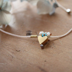 Golden heart tiny treasure bracelet. River Song jewelry handmade Shop Boston
