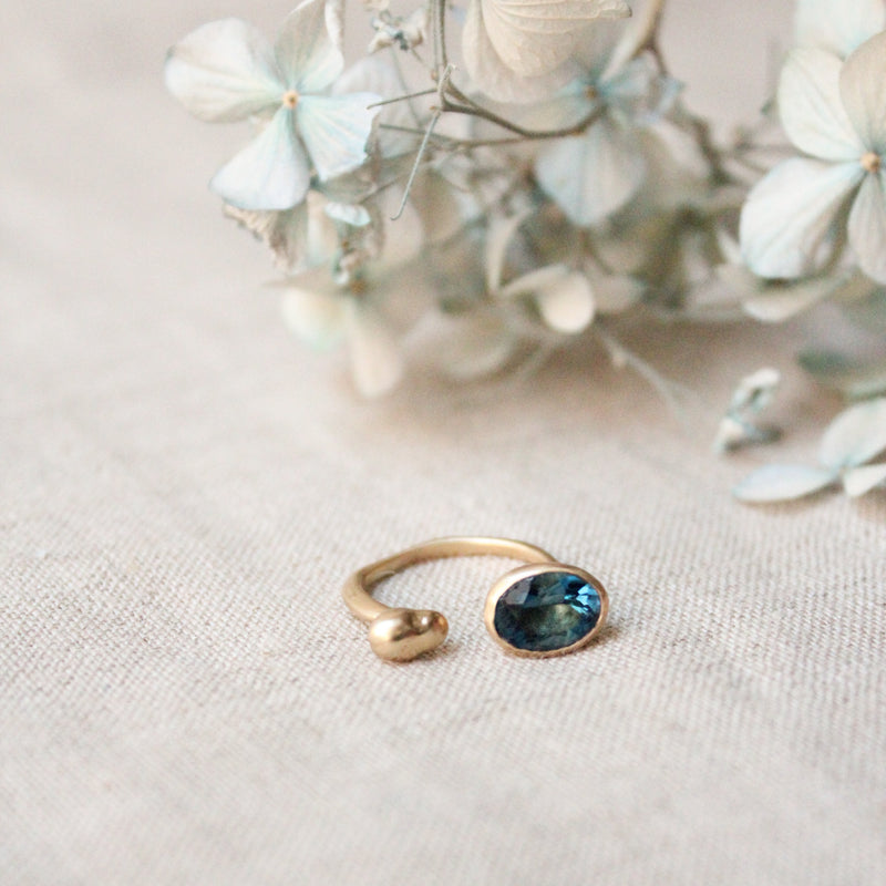 Julie Cohn Cleopatra adjustable bronze London Blue Topaz ring. Shop Boston