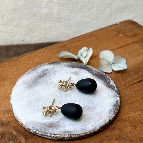 Julie Cohn Blossom Obsidian Bronze earrings. Shop Boston