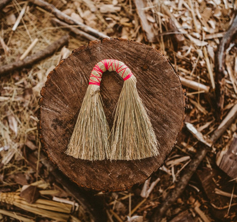 Double hand broom with neon pink nylon looping. by Sunhouse Craft. Handwoven in Kentucky.  